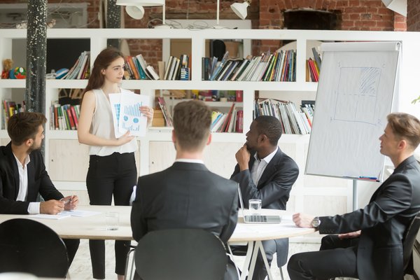 Businesswoman presenting design project to investors