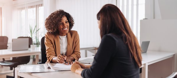 Businessperson with a client.