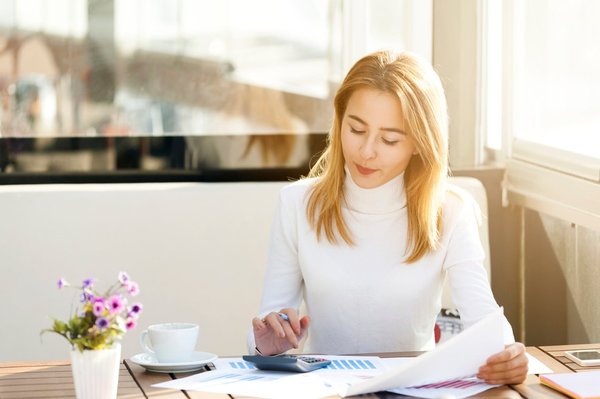 A person making a financial calculation.