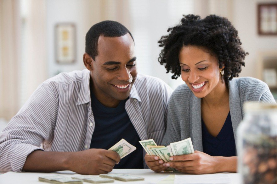 A couple counting lots of cash.